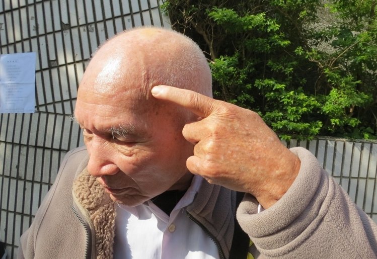 69年前曾被戒嚴部隊搶錢、打傷的“二二八事件”當事人陳木桂老先生,現年已經90歲。(圖/《聯合報》) 69年前曾被戒嚴部隊搶錢、打傷的“二二八事件”當事人陳木桂老先生,現年已經90歲。(圖/《聯合報》)